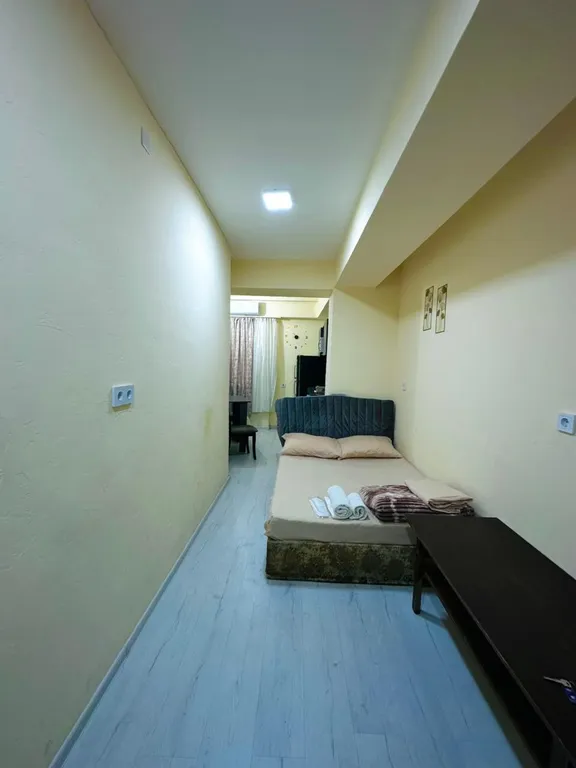 В центре рядом с музеем Сергея Параджанова