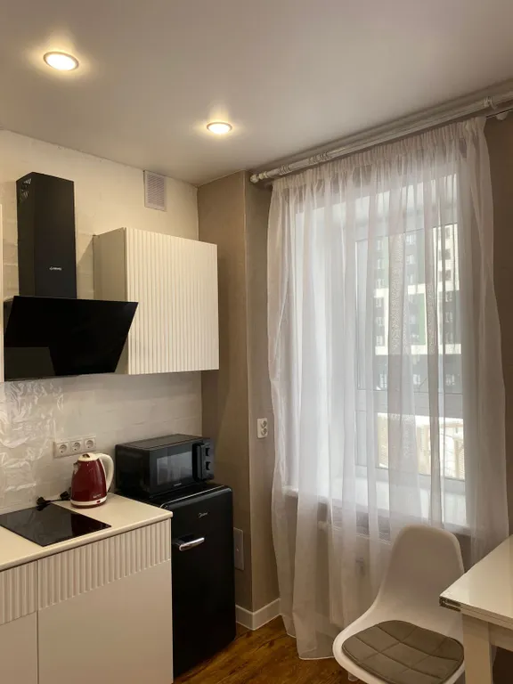 Уютная студия в зеленом массиве