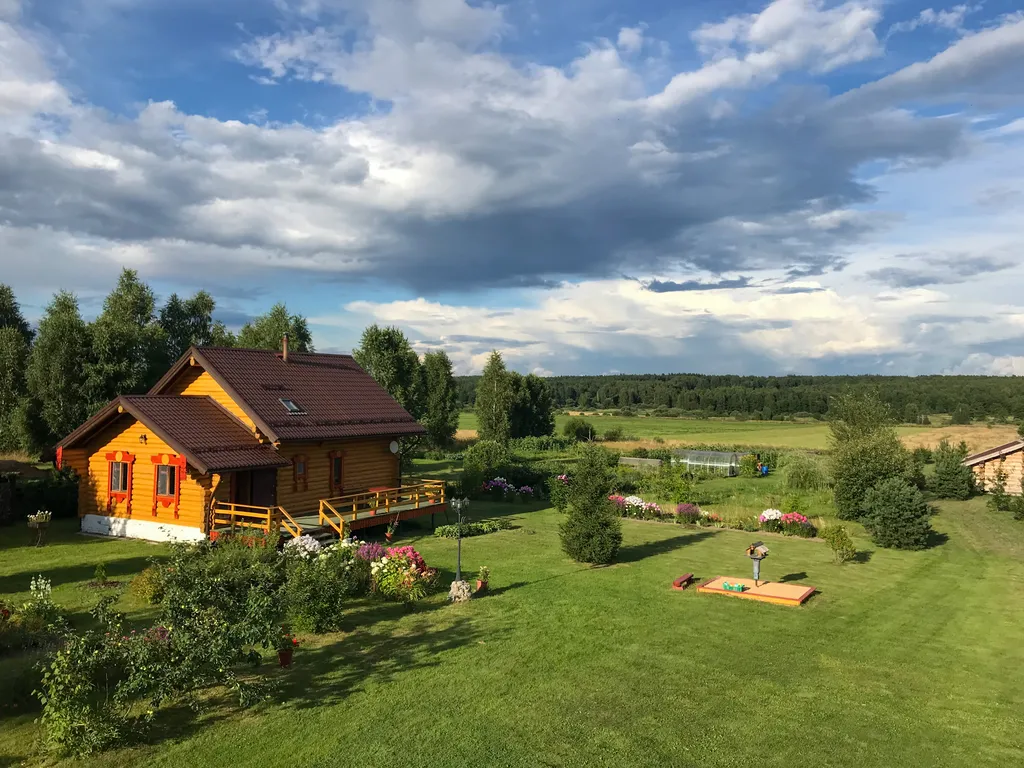 Дом в стиле Rustic с баней на дровах