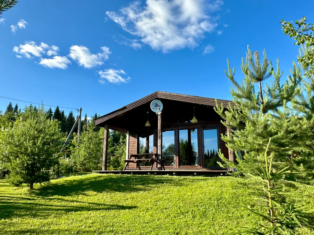 Коттедж с сауной и панорамным остеклением