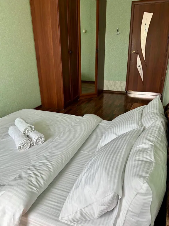 Двухкомнатная квартира в тихом районе рядом с центром