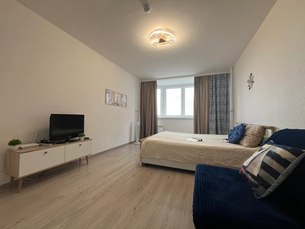 Светлая квартира с видом на закат в современном ЖК Геометрия