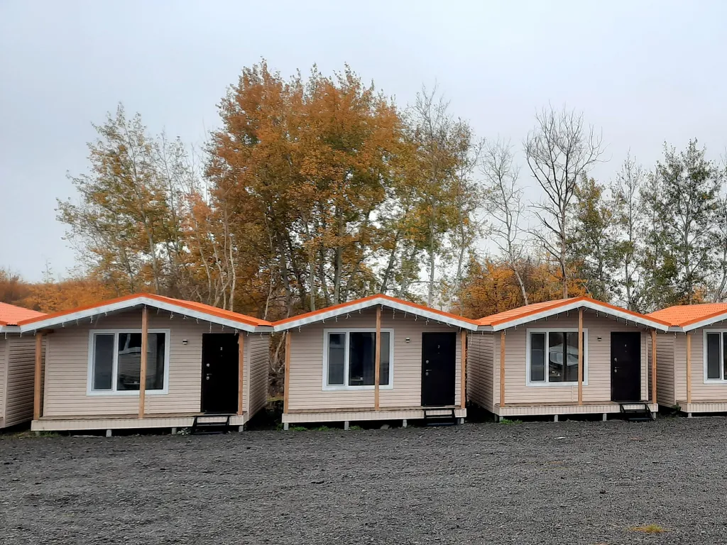 Уютный четырехместный Домик де-люкс с отдельными кроватями