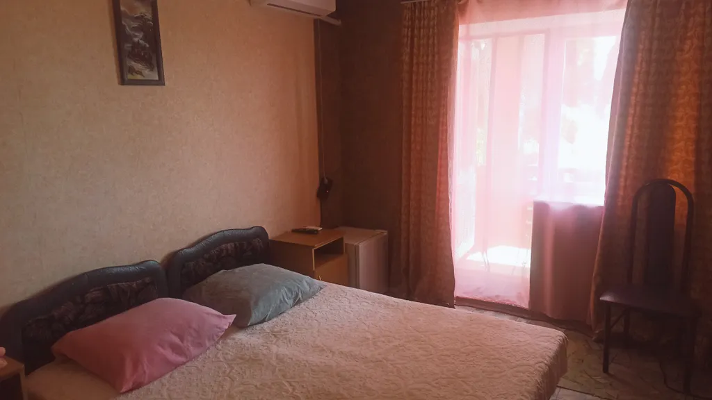 8. Двухместный номер с 2 отдельными кроватями стандарт с балконом