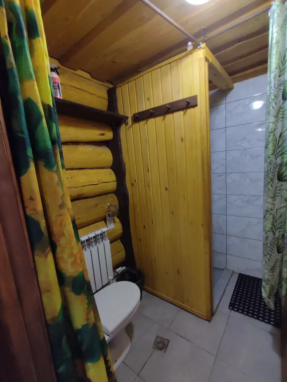 Бревенчатый 2-комнатный эко дом с большой верандой