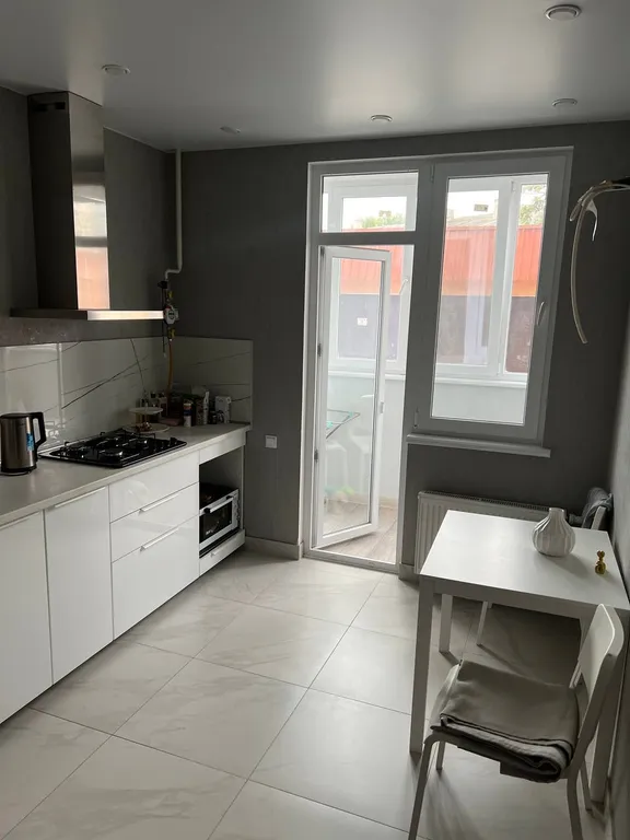 Квартира с панорамным окном, в престижном ЖК