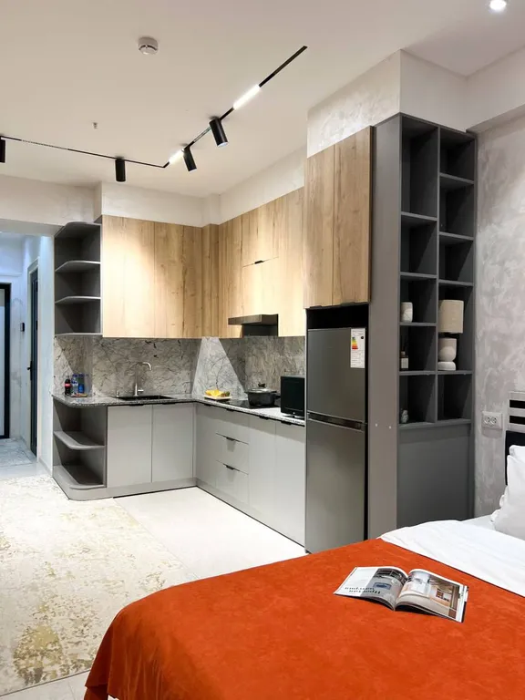 Уютная дизайнерская студия с панорамным видом на центр Ташкента