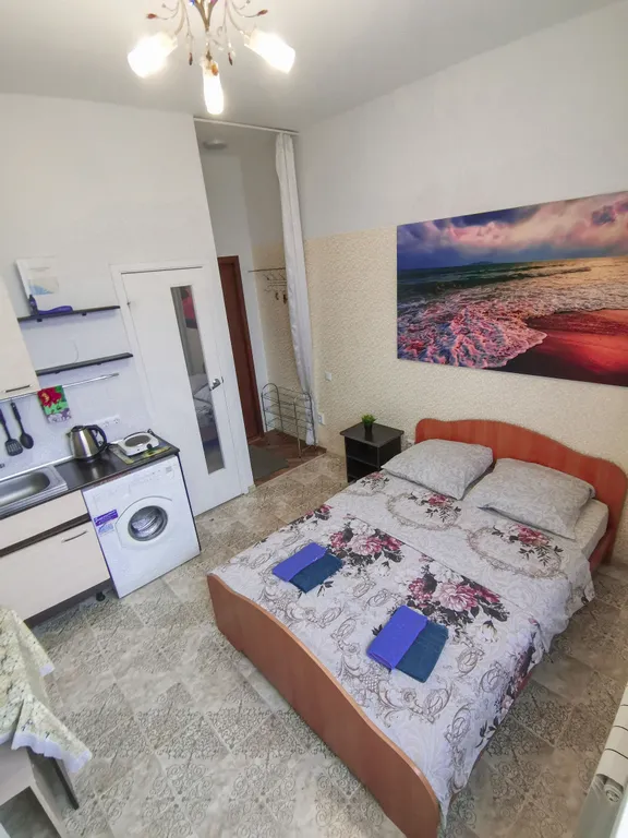 Студия на берегу Ангары с видом на красивый сквер и реку