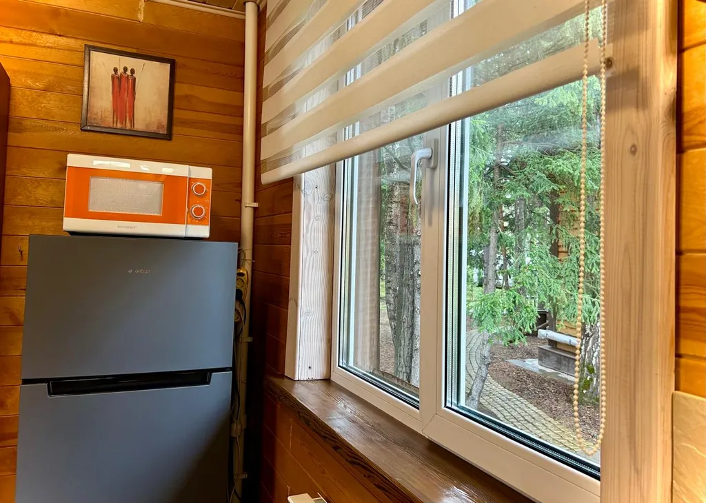 Коттедж с сауной на участке с хвойным лесом поблизости от Красноярска