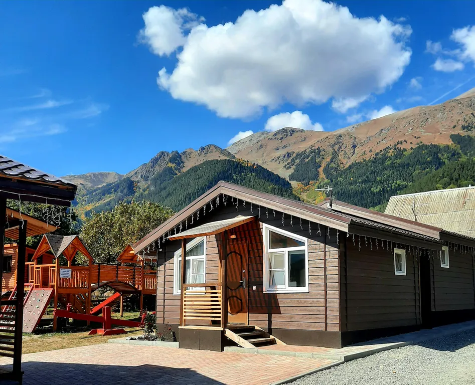 Коттедж Трёхкомнатные апартаменты с видом на горы — Архыз