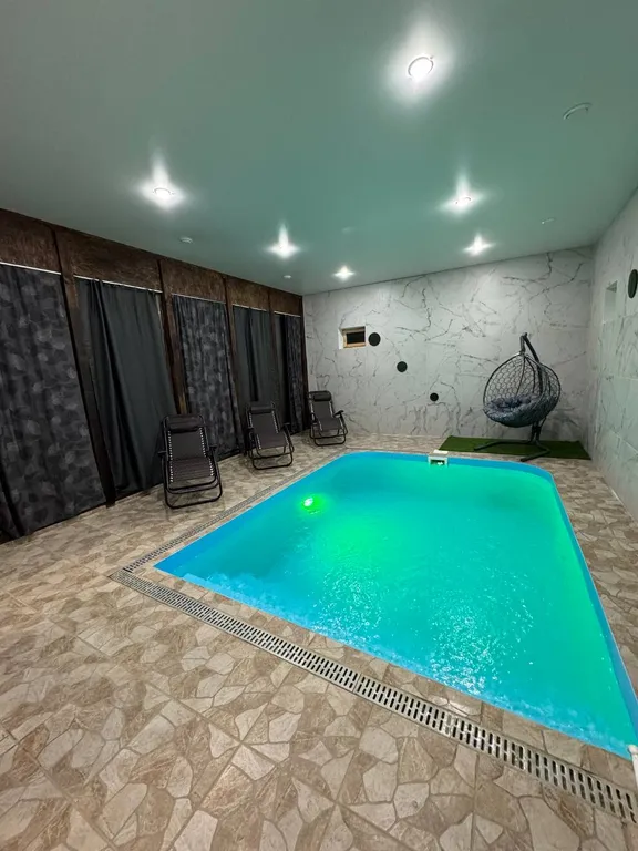 Дизайнерский коттедж из сруба