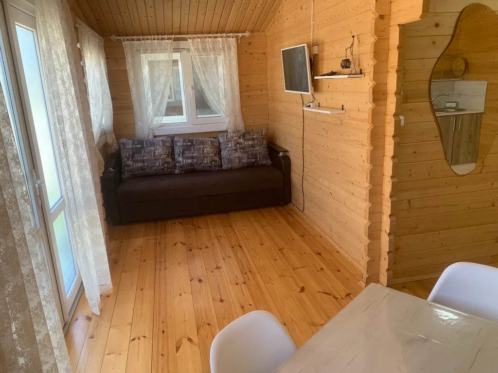 Индивидуальный трехкомнатный эко-дом с террасой и кухней Ветер Перемен