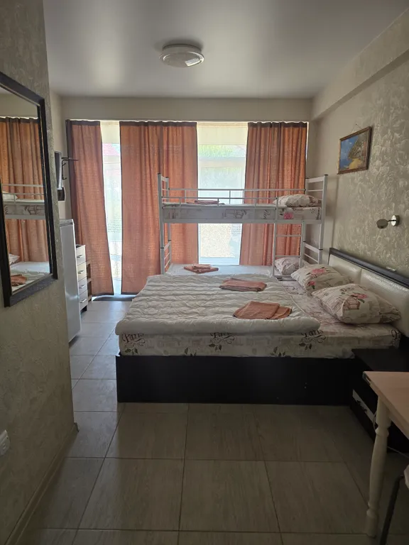 Комната в городке Олимпия