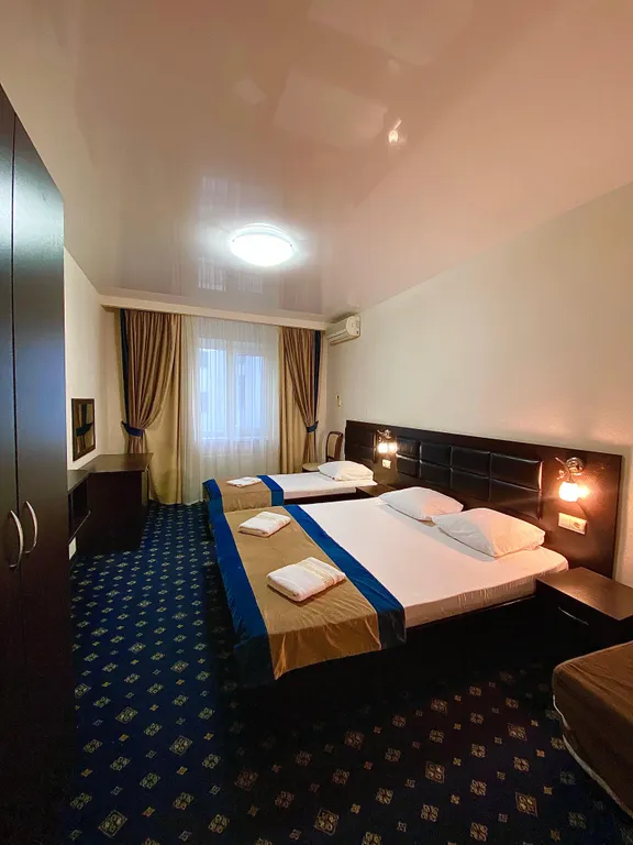 Четырехместный номер Люкс