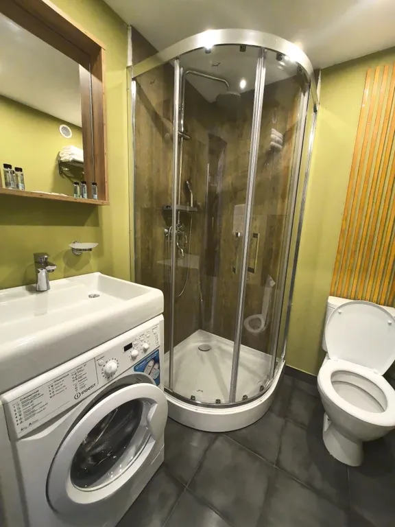 Квартира Двухкомнатная студия с кухней с 2-я санузлами и TV в каждой комнате — Коммунар