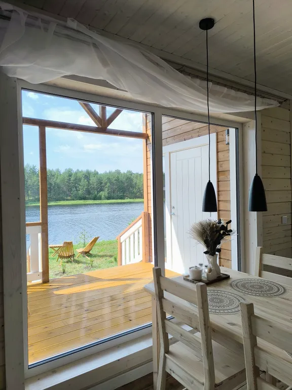 Коттедж Незабываемый отдых в доме с видом на реку и лес — Нурмойла