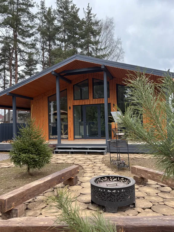 Коттедж Уютный коттедж с сауной и купелью — Бугры