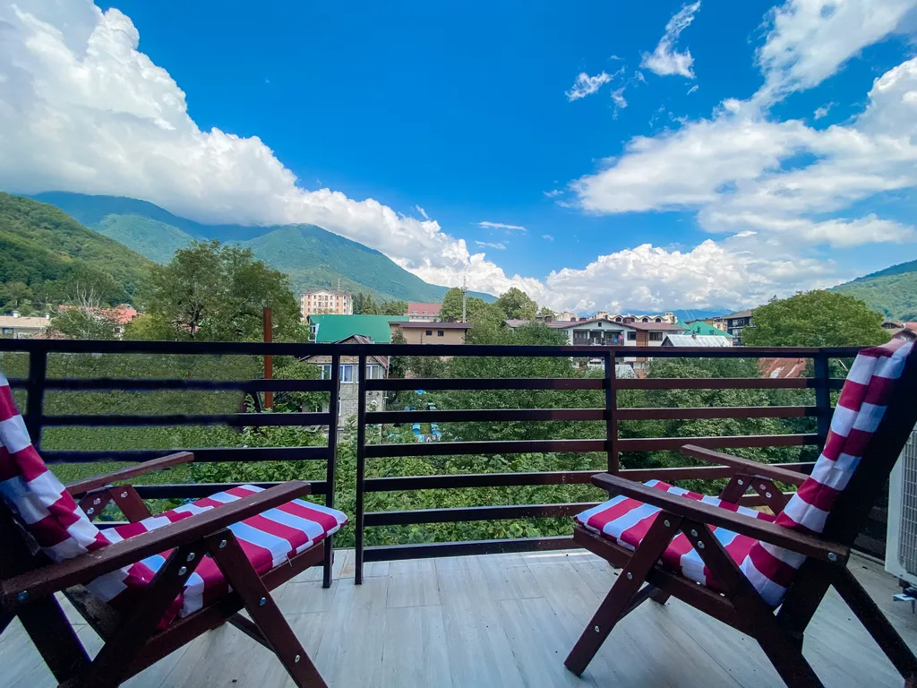 Апартаменты с террасой с панорамным видом на горы