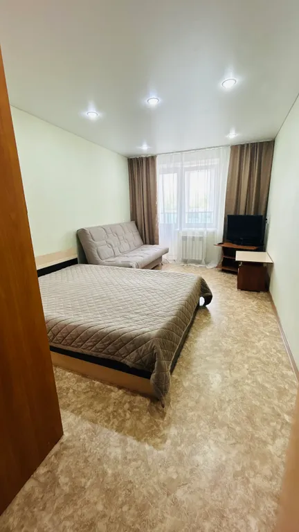 Уютная квартира в новом районе — аренда посуточно в Октябрьский