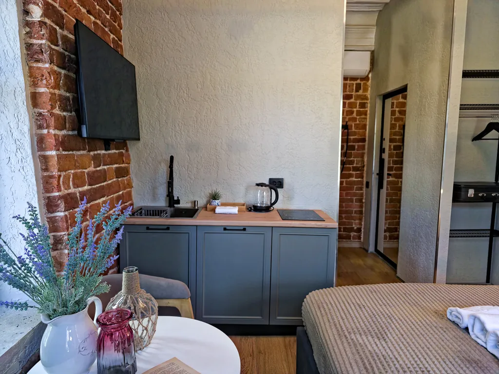 Изящная студия в бутик апарт-отеле Дом с гаргульями