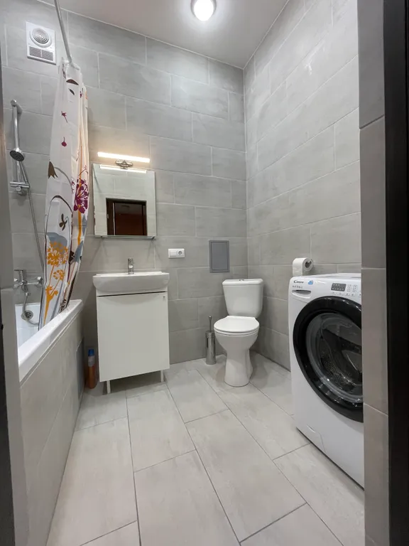 Уютная квартира с мансардными окнами