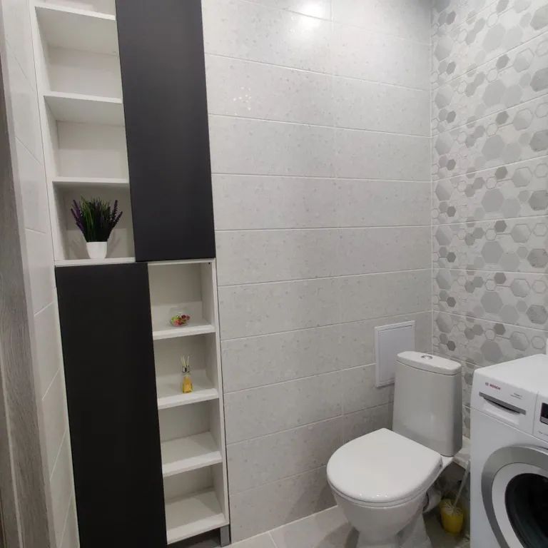 Дизайнерская и просторная квартира недалеко от центра