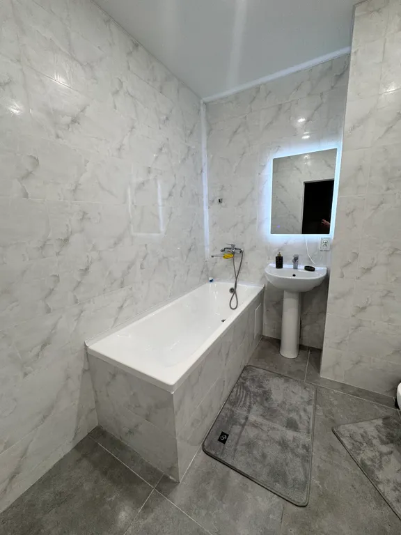 Уютная и новая квартира напротив Алматы Арены