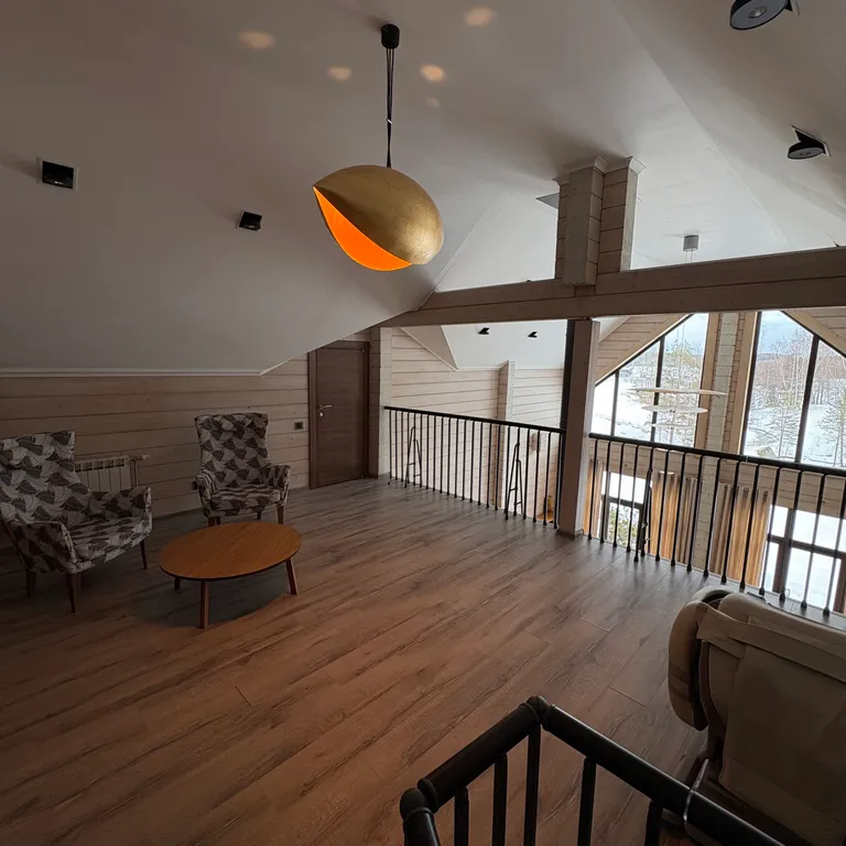 Современный коттедж на берегу озера Лавиярви