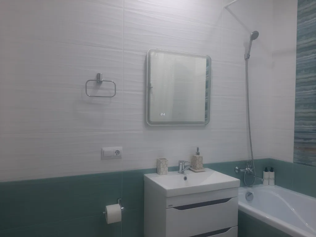 Уютная студия с видом на колесо обозрения