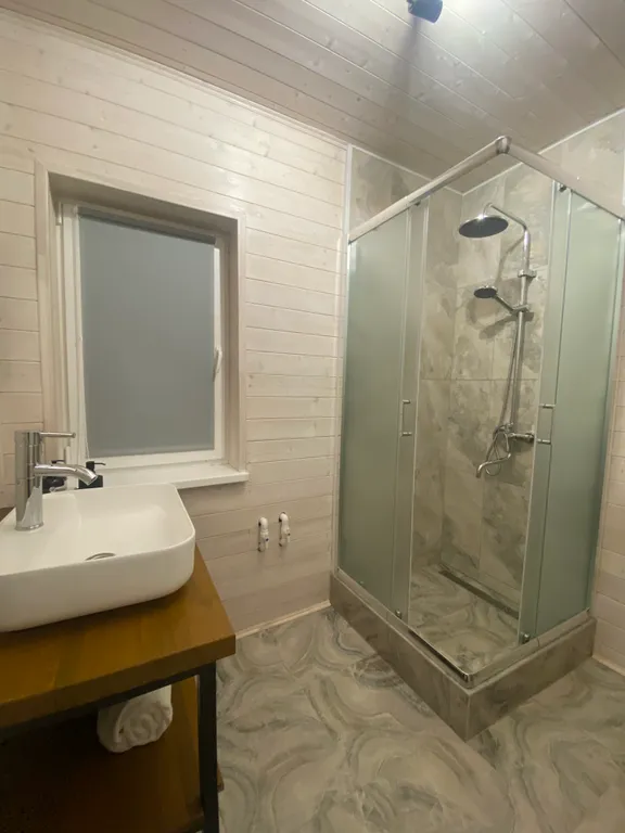 Дом с купелью на берегу реки