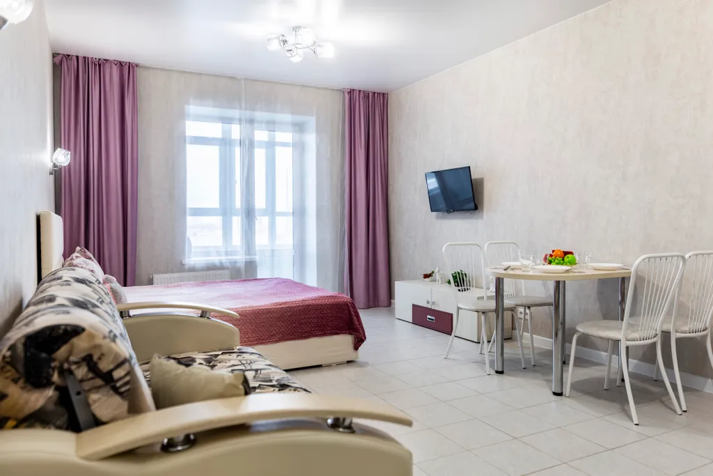 Просторная студия с отличным видом на город