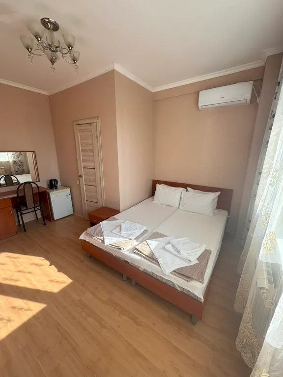 Трёхместный номер с балконом