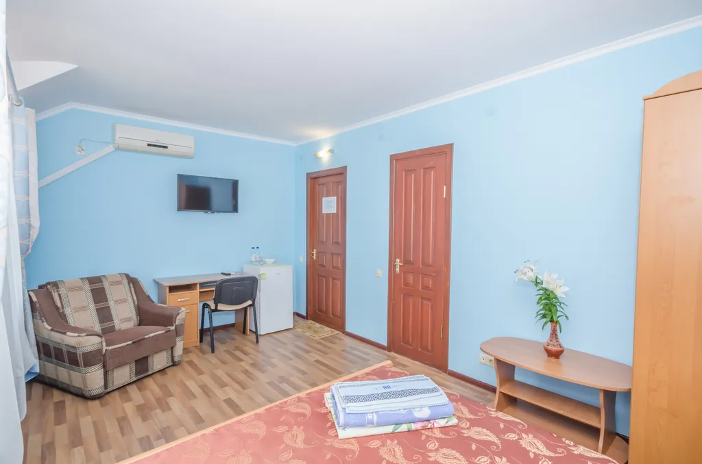 Двухместный Стандарт с двуспальной кроватью и дополнительным местом