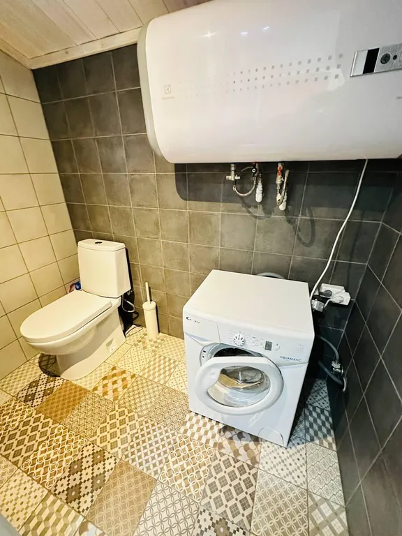 Уютный дом в скандинавском стиле среди сосен с сауной