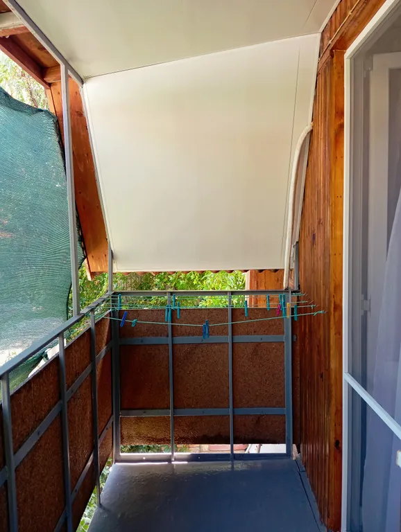 Деревянная мансарда с балконом