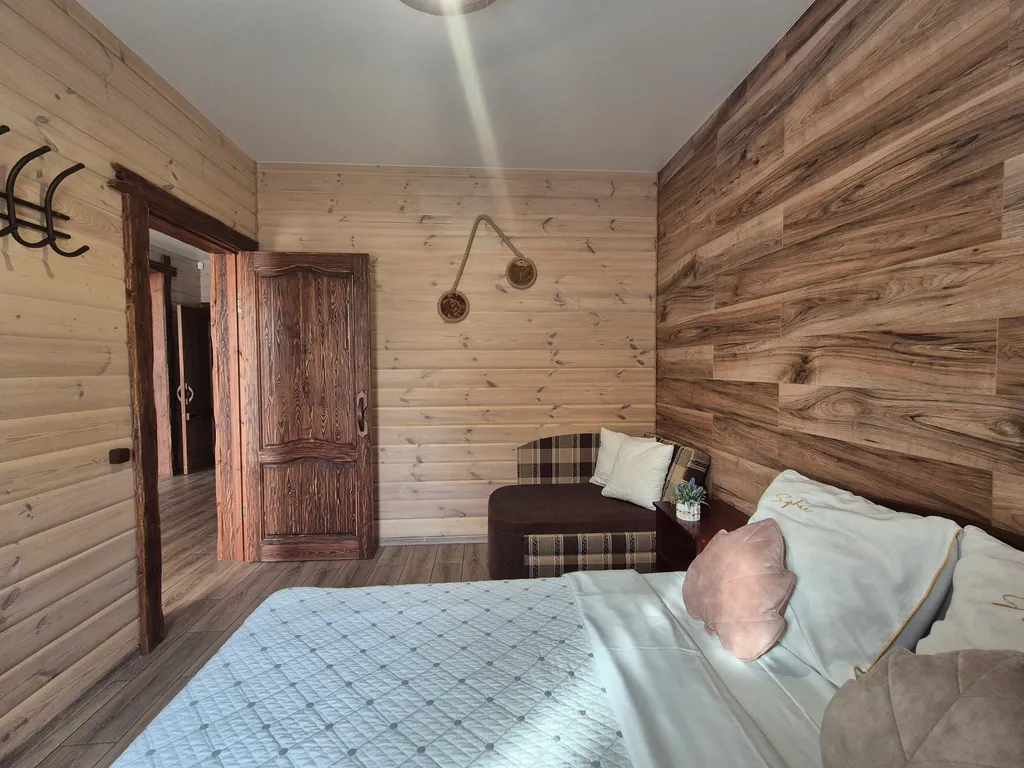 Чудесный дом с сауной и горячей купелью на побережье водохранилища