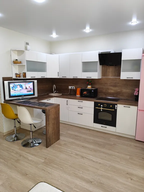 Уютная студия с видом на город