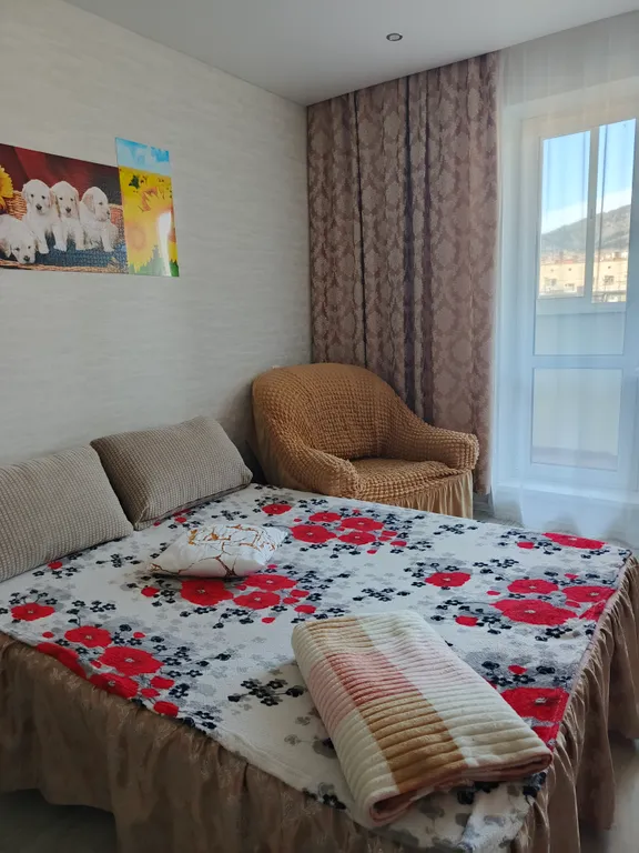 Уютная квартира студия в новом доме в центре города