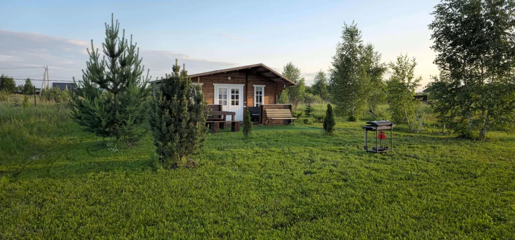 Коттедж Уютный домик на большом участке у озера — Никулино