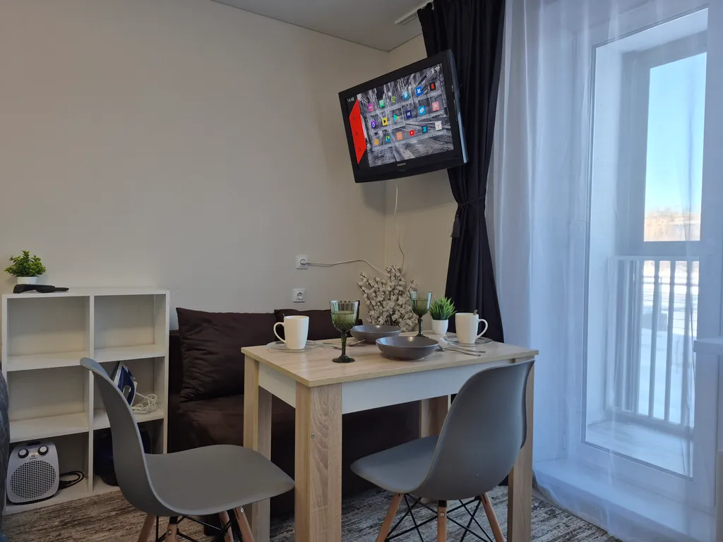 Студия на набережной с видом на реку