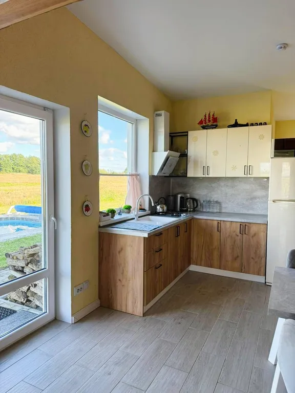 Уютный домик в деревне с баней и басейном