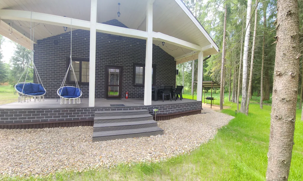 Коттедж в Forest house с сауной в лесу