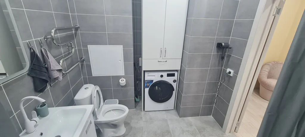 Уютная квартира-студия в новом ЖК недалеко от центра города