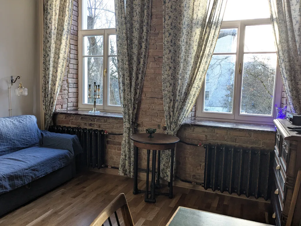 Уютная двухуровневая квартира-студия в доме XIX века