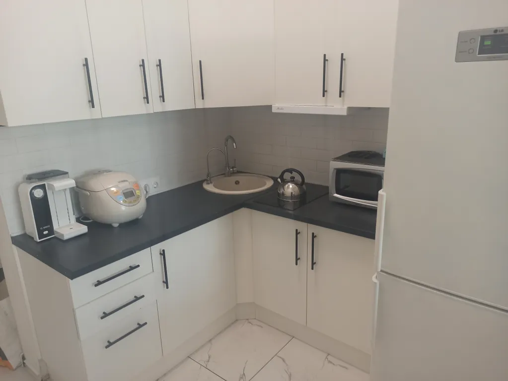 Двухуровневый апартамент в здании ТЦ