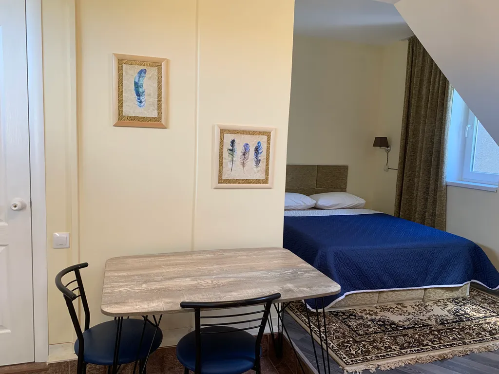 Квартира Уютная комната-студия с видом на сад — Севастополь