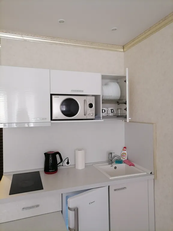 Резиденция на первой линии около Хилтона