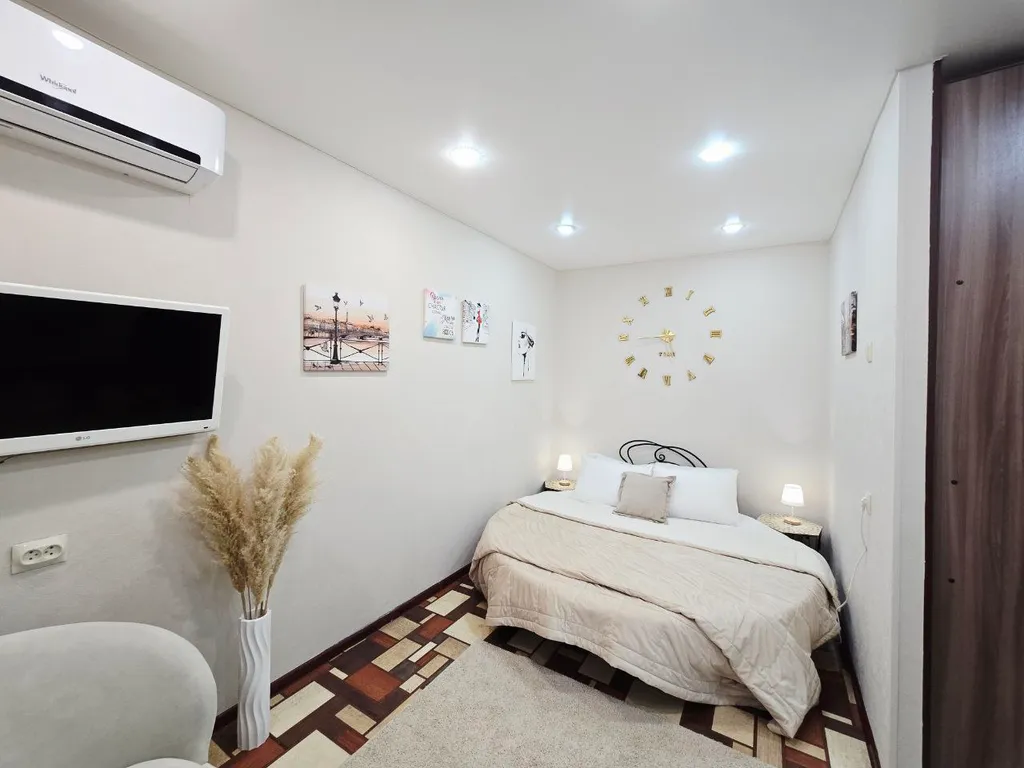 Уютная студия с круглой кроватью