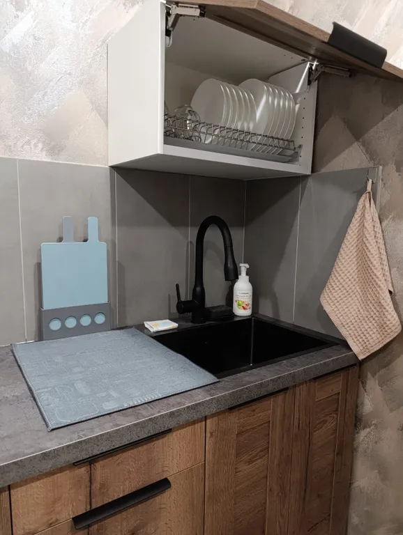 Уютная квартира в тихом районе рядом с центром