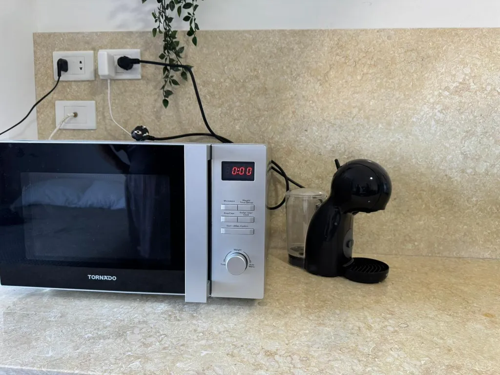 Уютная студия в терракотовом цвете на берегу моря, первая линия